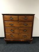 A Victorian pine five drawer chest