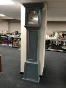 A continental painted long cased clock with brass and silvered dial, the dial dated 1780,