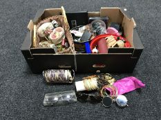 A box of costume jewellery, sunglasses, bottle openers, teaspoons etc.
