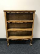 Set of inlaid burr walnut serpentine fronted bookshelves