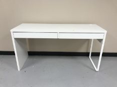 A contemporary two drawer desk