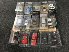 A tray of twenty James Bond die cast vehicles in plastic display cases