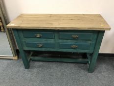A painted pine four drawer sideboard,