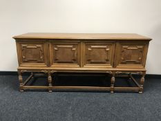An oak four door sideboard