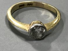 An 18ct gold diamond solitaire ring, approximately 0.