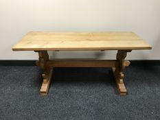 An oak refectory coffee table