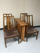 A teak Meredew drop leaf table and four chairs