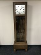 A mid 20th century oak cased regulator clock
