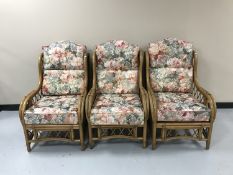 Three wicker conservatory armchairs