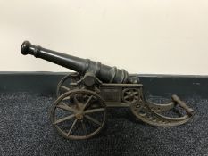 A metal cannon on carriage