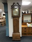 An oak longcase clock with brass and silvered moonphase dial signed John Turnbull of Hawick,