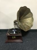 An HMV table top gramophone with brass horn