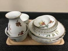 A tray of thirteen pieces of Royal Worcester Evesham china including flan dishes, serving plates,