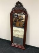 A late 19th century domed topped hall mirror