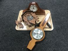 A tray of Black Forest style cuckoo clock with pendulum and weights,