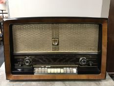 A mid twentieth century walnut cased Philips Bi-Ampli radio