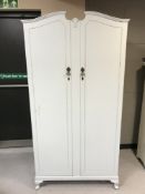 A painted double door wardrobe