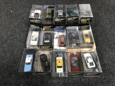 A tray of twenty James Bond die cast vehicles in plastic display cases