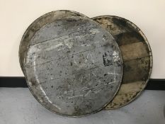 Seven whiskey barrel lids