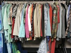 A rail of lady's designer clothing with makes including Max Mara, Yarell, Avant Guarde,