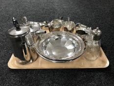 A tray of silver plated pieces - swing handled basket, part tea services, gravy boat,
