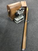 A 1940's vintage projector with screen,