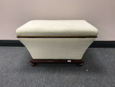 A 19th century sarcophagus form storage box of bun feet, dimension 79 cm x 51 cm.