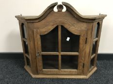 A late 19th century oak wall cabinet