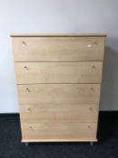 A contemporary beech six drawer chest