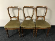 Three walnut dining chairs