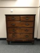 A Victorian pine five drawer chest