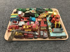 A tray containing a Dinky Toys 973 Eaton Yale articulated tractor with shovel,