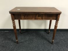 A late 19th century mahogany turnover top tea table