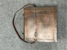 A wooden triple-section huntsman's bottle carrier, with leather shoulder strap.