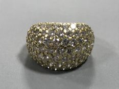 An 18ct gold large bombe diamond ring, set with 80 good quality diamonds, approximately 4ct.