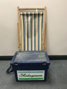 A mid 20th century folding deck chair and Shakespeare fishing box