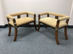A pair of late Victorian window seats, upholstered in fleur de lis two tone fabric,