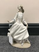 A Lladro bisque figure of Cinderella,