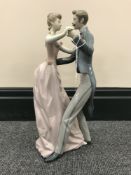 A Lladro figure of a lady and gentleman dancing,