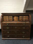 A nineteenth century Continental painted oak cylinder bureau