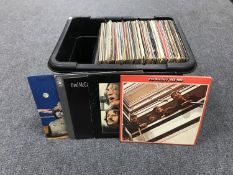 A box of approximately 100 assorted LP's and double albums including The Beatles,
