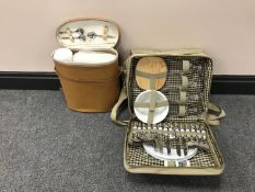 Two picnic bags containing picnic sets