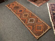 A Suzni carpet runner