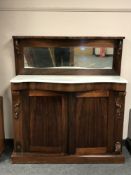 An early Victorian rosewood marble topped chiffonier