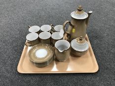 A fifteen piece Denby stoneware coffee set