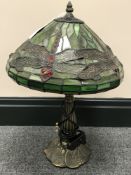 A Tiffany style table lamp and shade with dragonfly decoration