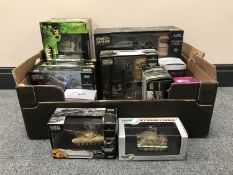 A box of thirteen boxed Unimax Forces of Valor and Dragon Armour die cast military vehicles and