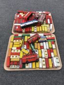 Two trays containing a large quantity of play worn die cast vehicles - buses