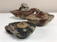 Three Chinese antique carved soapstone teapots.