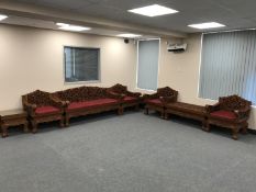 A good quality eight piece carved Eastern hardwood lounge suite, comprising of three seater settee,